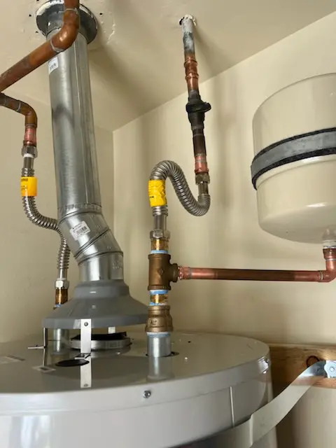Water heater installation and plumbing repair in Holly